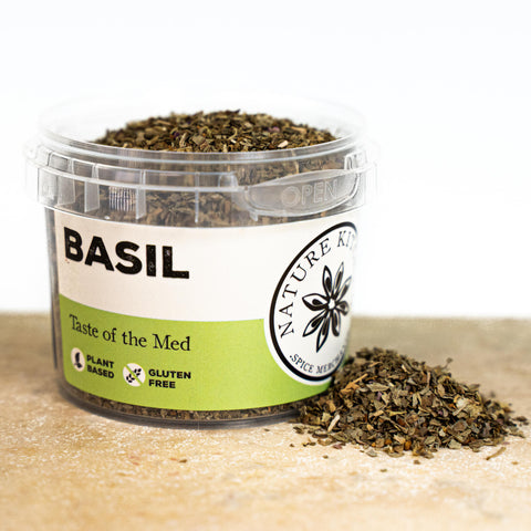 dried basil in a nature kitchen container