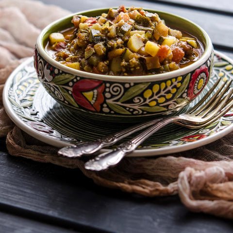 Vegetable stew in a patterned bowl