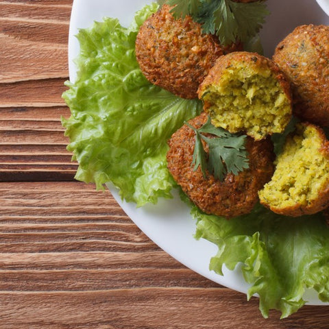 falafel with salad leaves and coriander to garnish