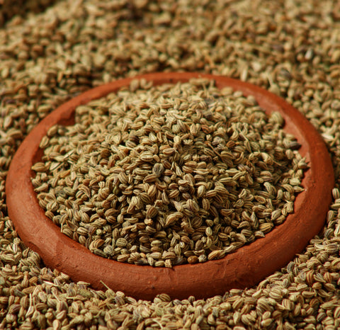 celery seeds in a clay dish