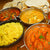 3 varieties of curry with pilau rice naan and papad