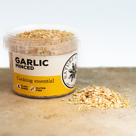 Garlic minced in a pot