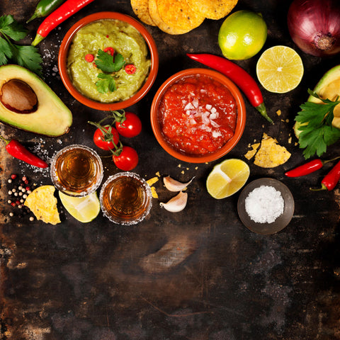 avacado and salsa dips with limes and chilli