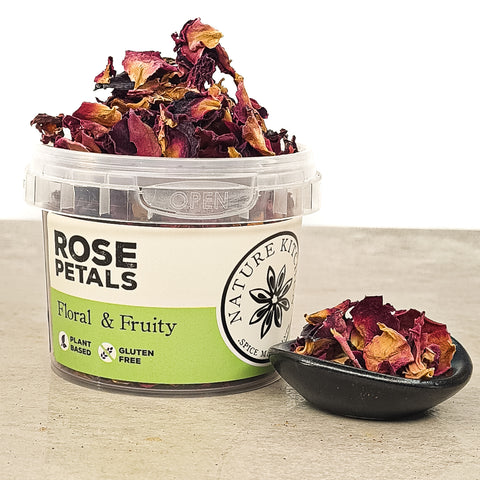 dried edible rose petals in a pinch pot